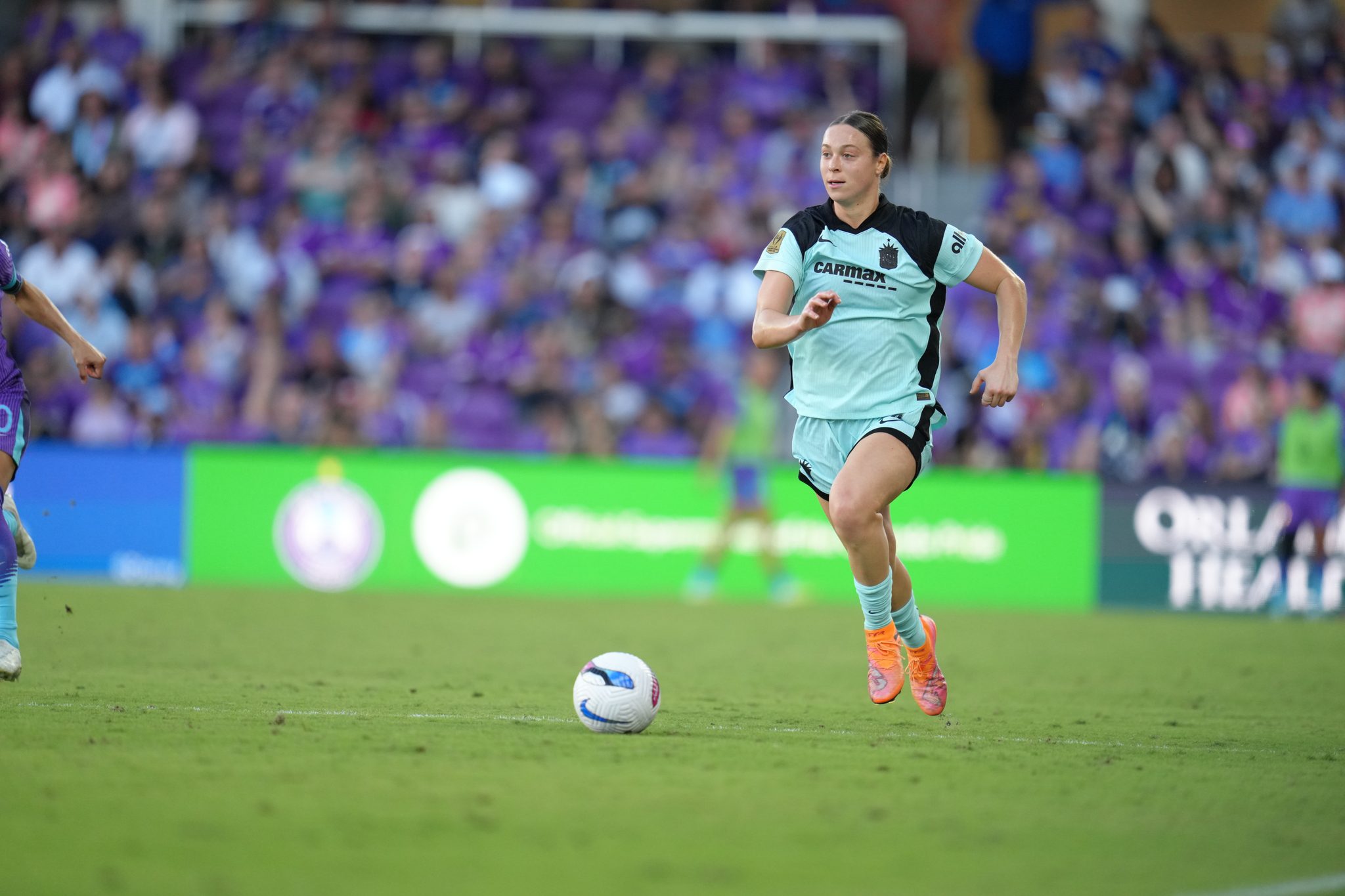 Gotham FC defender Lilly Reale advances the ball.