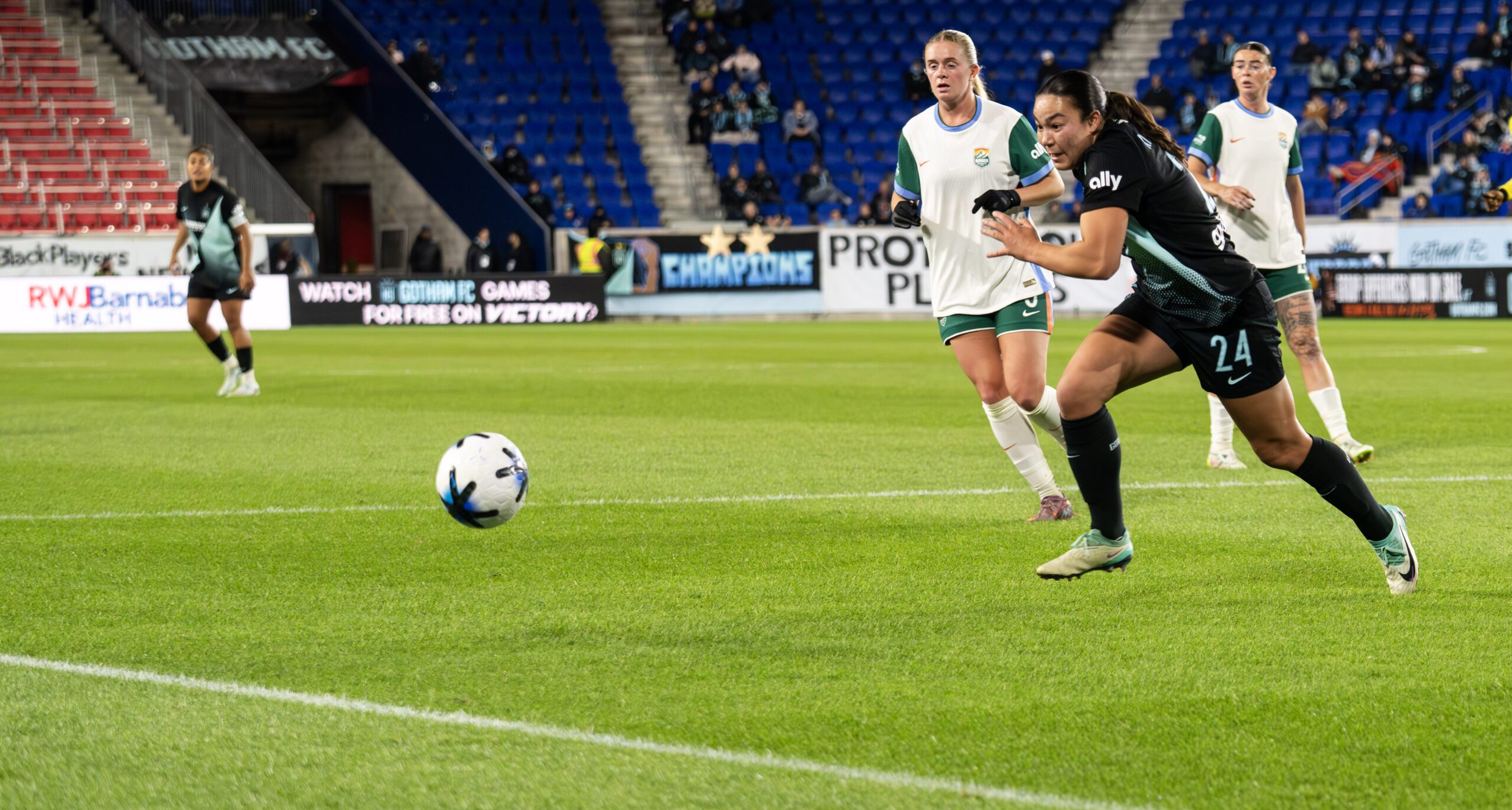 Andrea Kitahata of Gotham FC races for the ball.