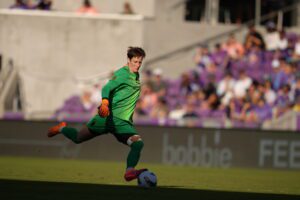 Gotham FC goalkeeper Ann-Katrin Berger punts the ball.