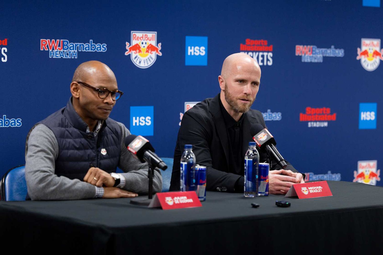 Julian de Guzman and Michael Bradley address the press.