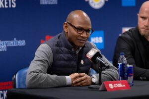 Julian de Guzman and Michael Bradley address the press.