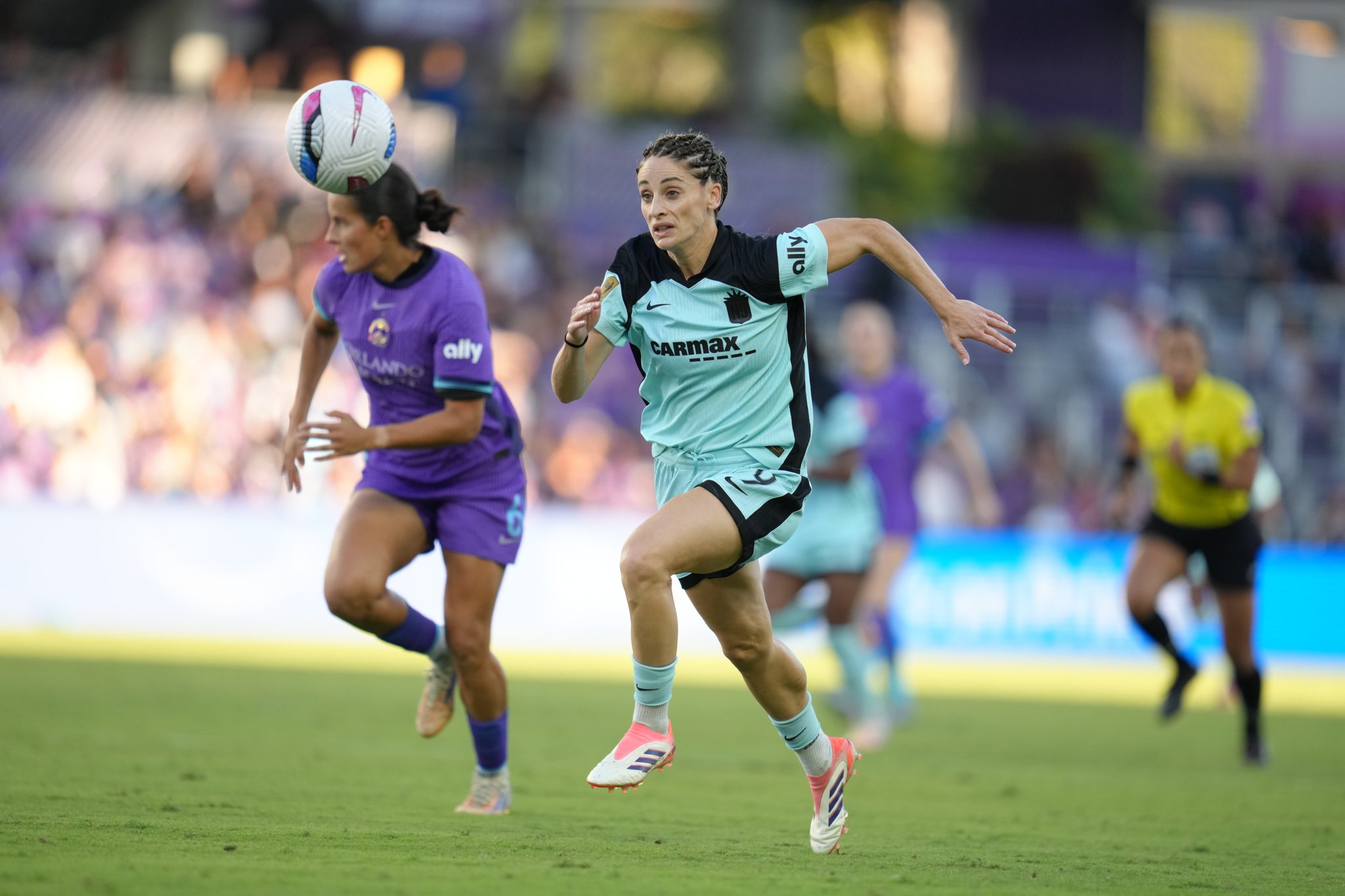 Esther competes for the ball during a Gotham FC match.