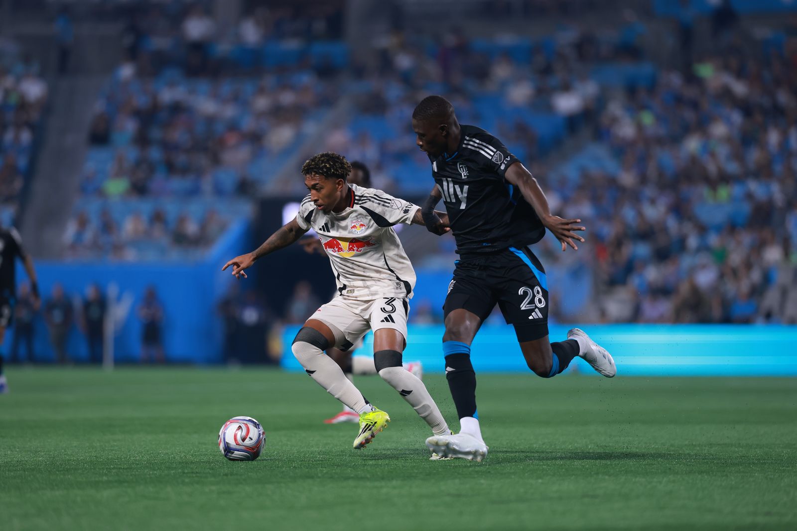 Red Bull New York defender Jahkeele Marshall-Rutty competes against Charlotte FC.