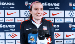 USWNT midfielder Rose Lavelle speaks to the media.