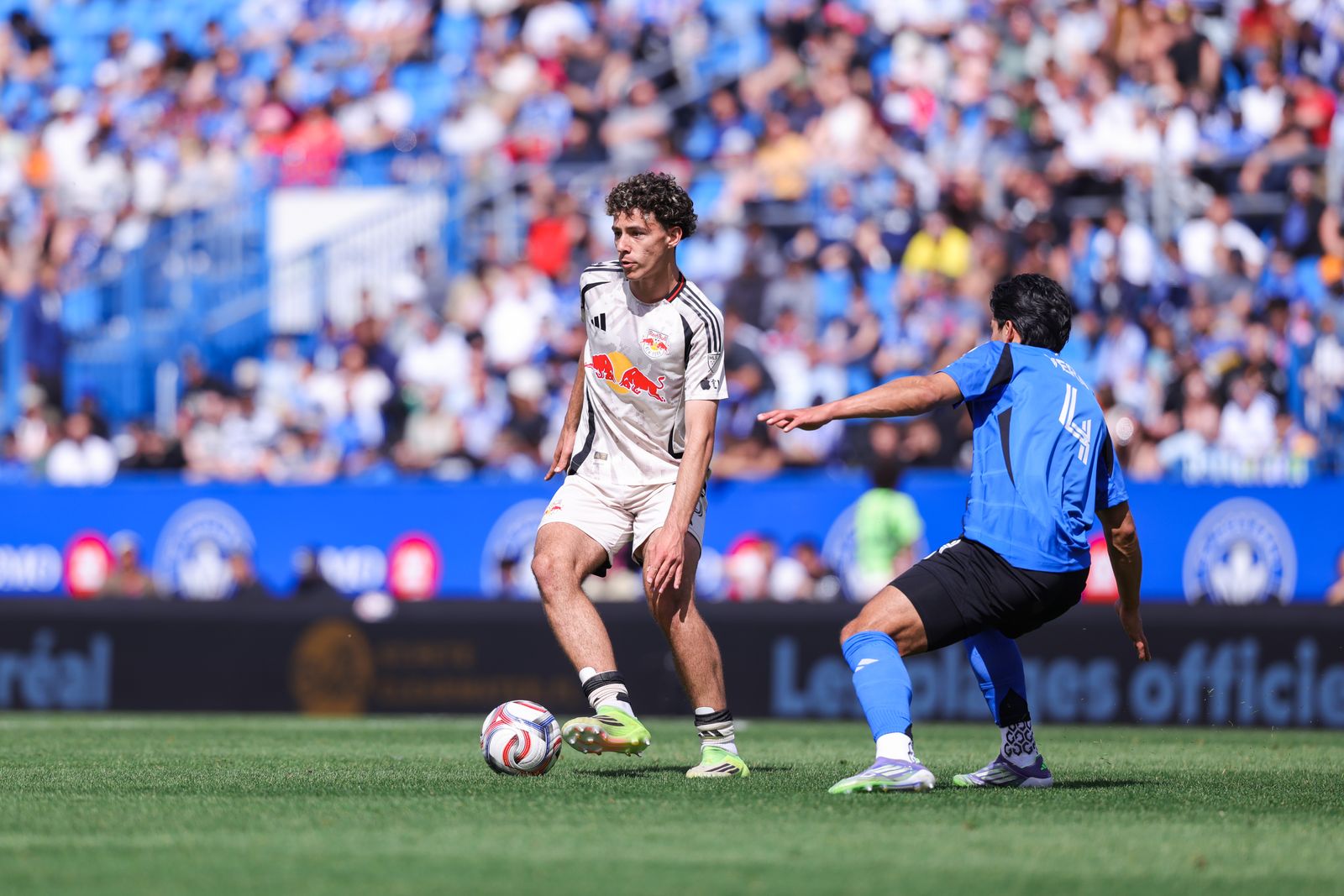 Red Bull New York midfielder Adri Mehmet controls the ball.