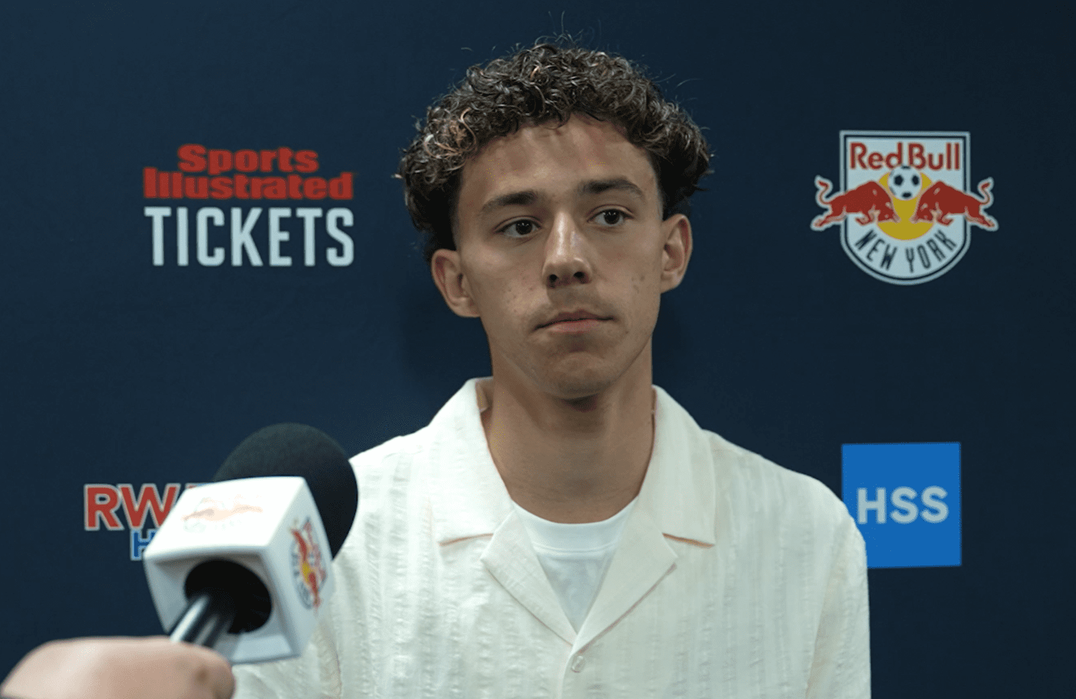 Red Bull New York midfielder Adri Mehmeti speaks with the media.
