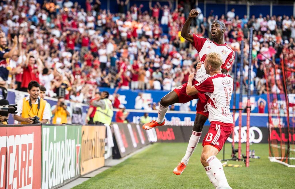 Bradley Wright-Phillips celebrates a Red Bull New York goal with Mike Grella.