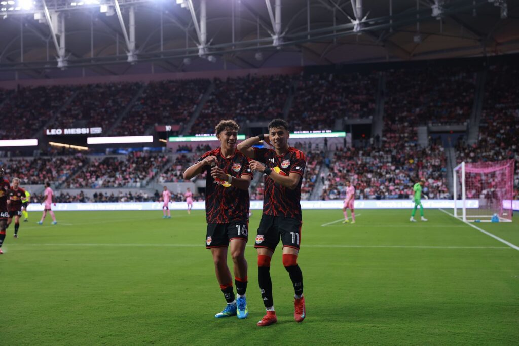 Red Bull New York forwards Julian Hall and Jorge Ruvalcaba celebrate together after combining for a goal.