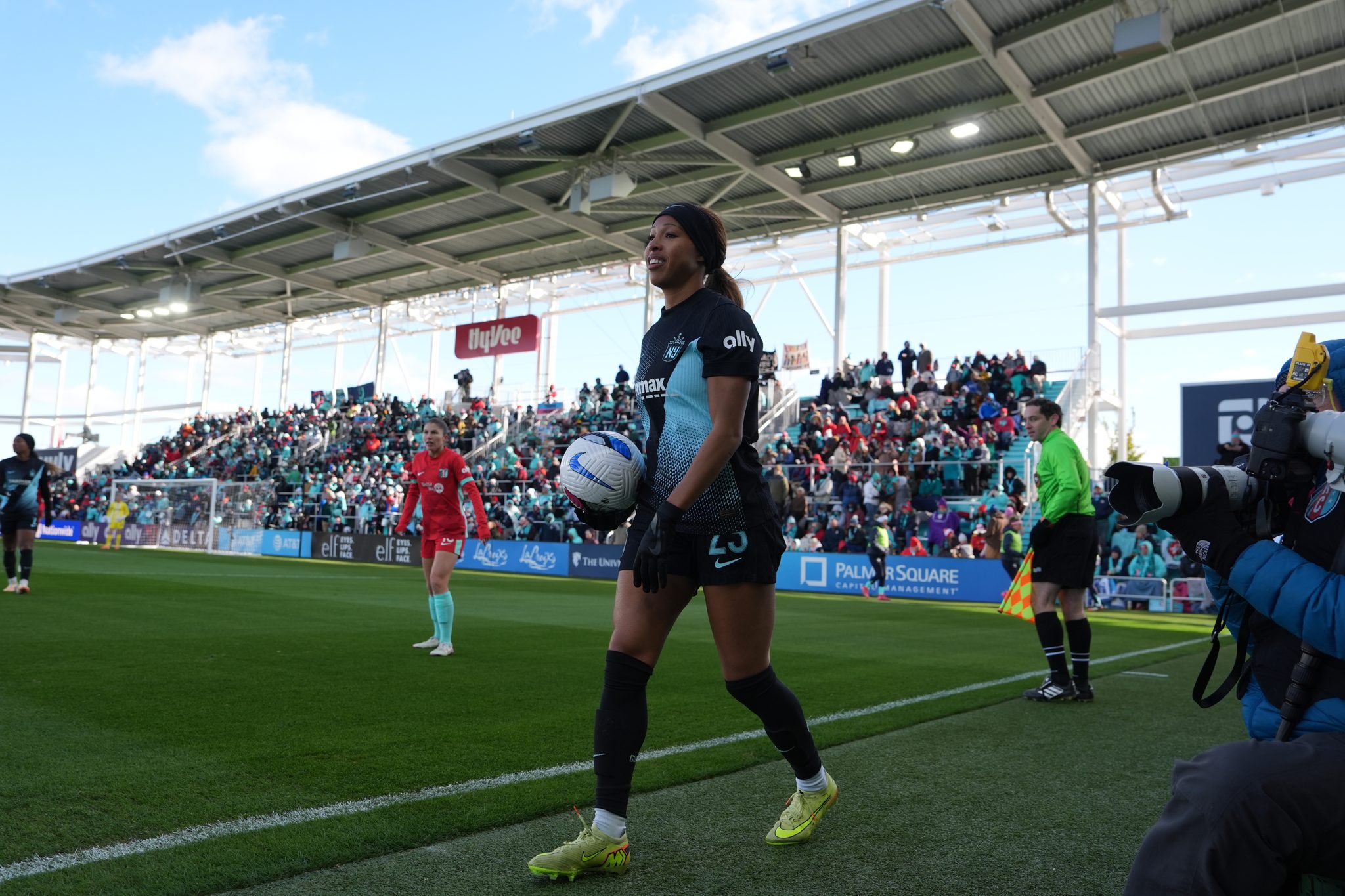Gotham FC forward Midge Purce takes a throw in.