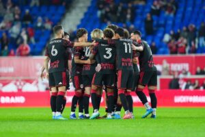 Red Bull New York players celebrate together.