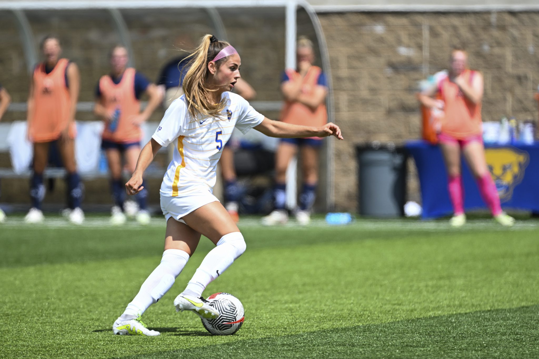 University of Pittsburgh midfielder Sarah Schupansky performs a dribble.