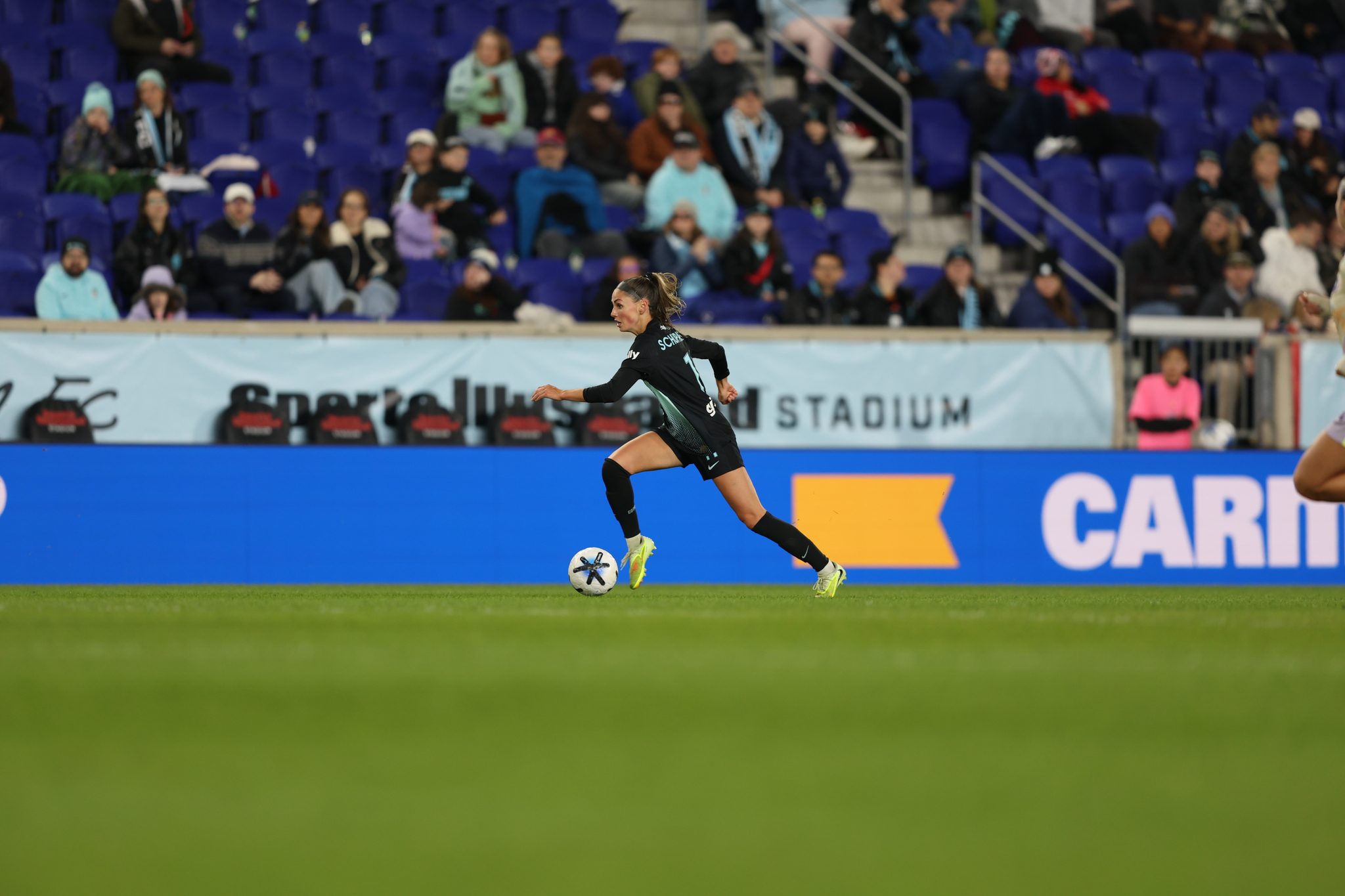 Gotham FC midfielder Sarah Schupansky moves the ball.