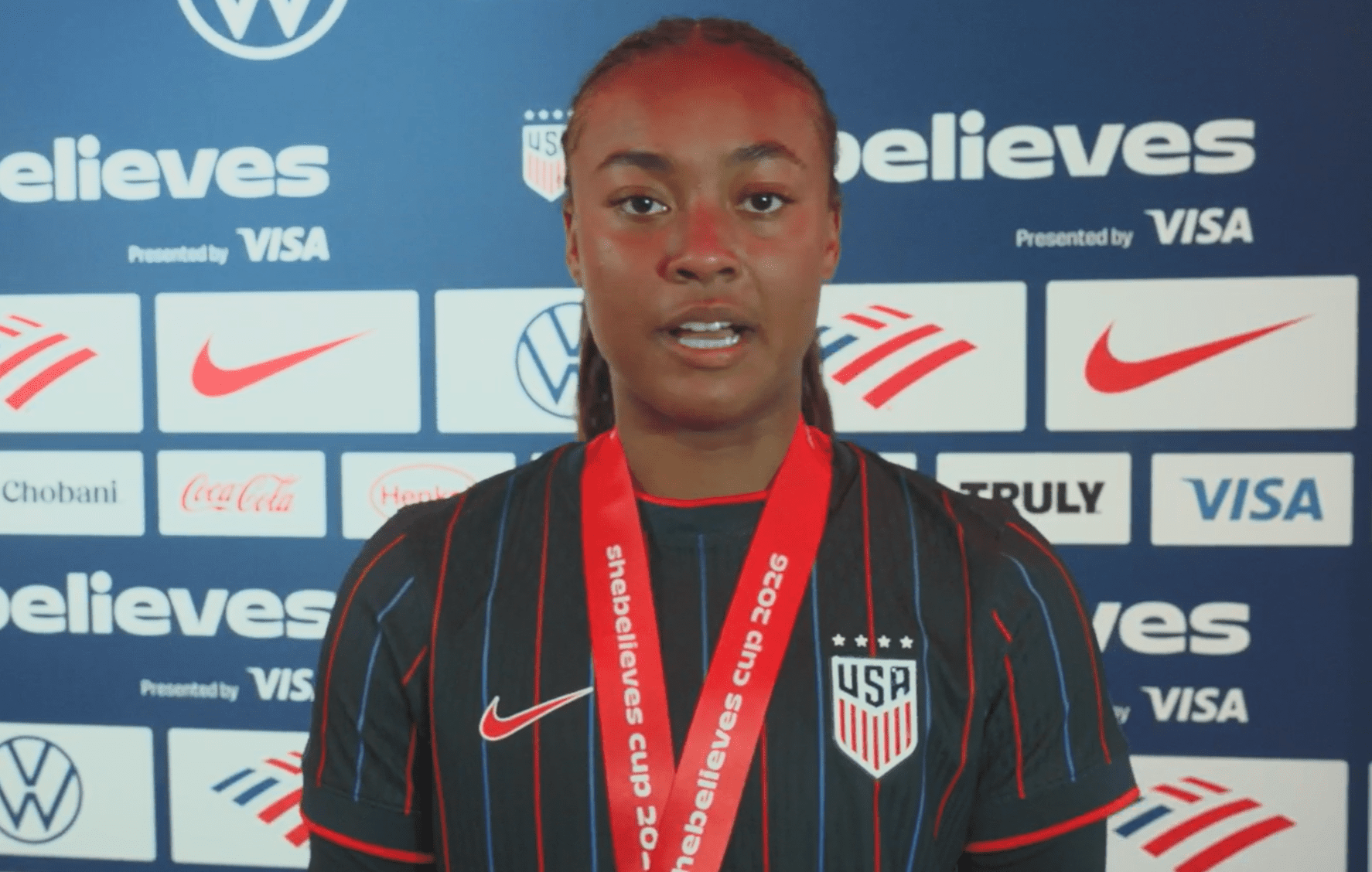 USWNT midfielder Jaedyn Shaw speaks to the media.