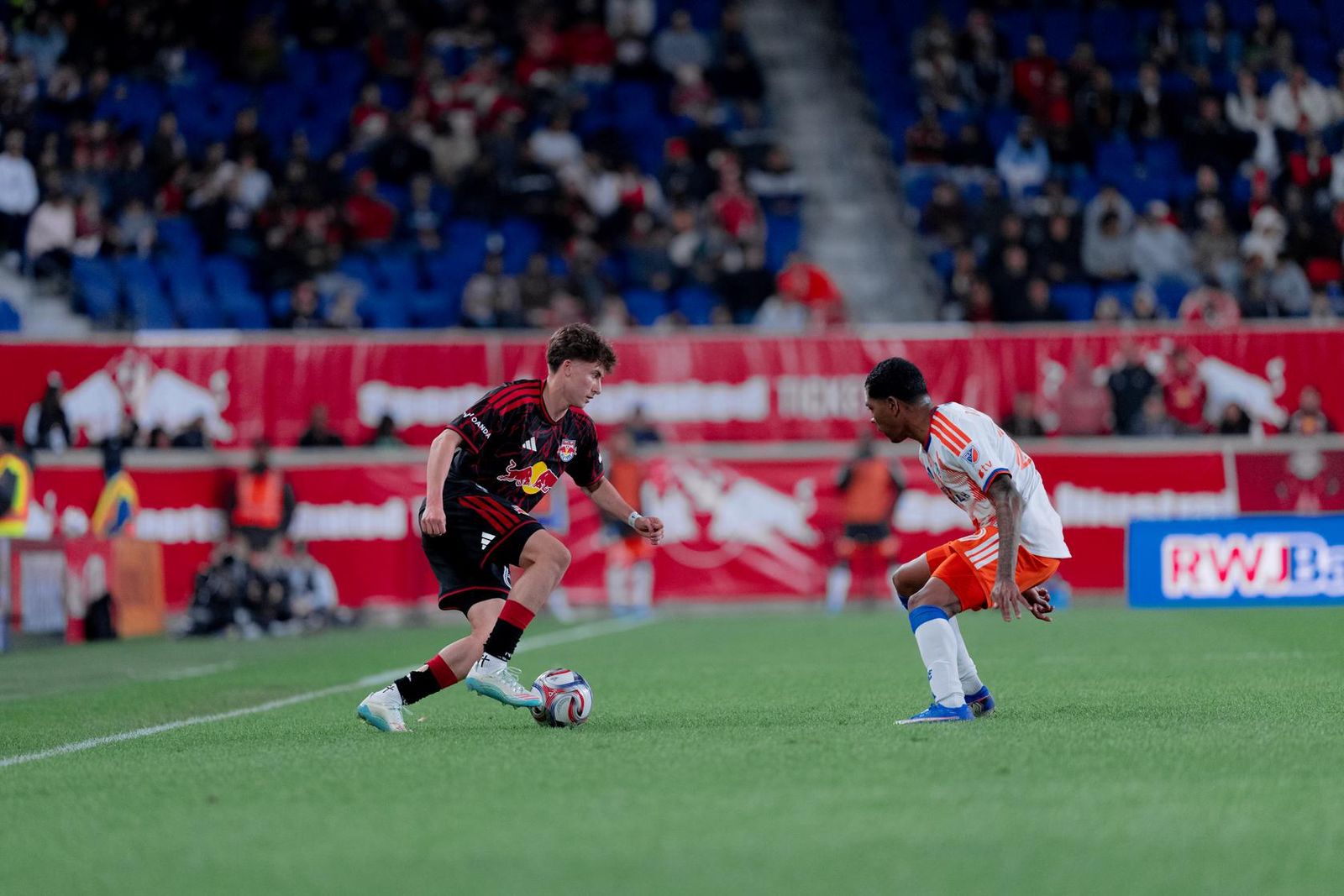 Red Bull New York forward Tanner Rosborough performs a dribble.