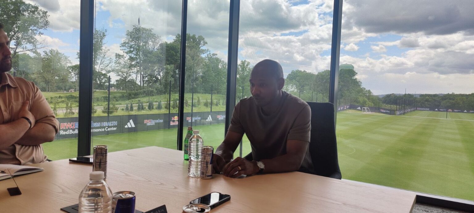 Red Bull New York head of sport Julian de Guzman meets with reporters.