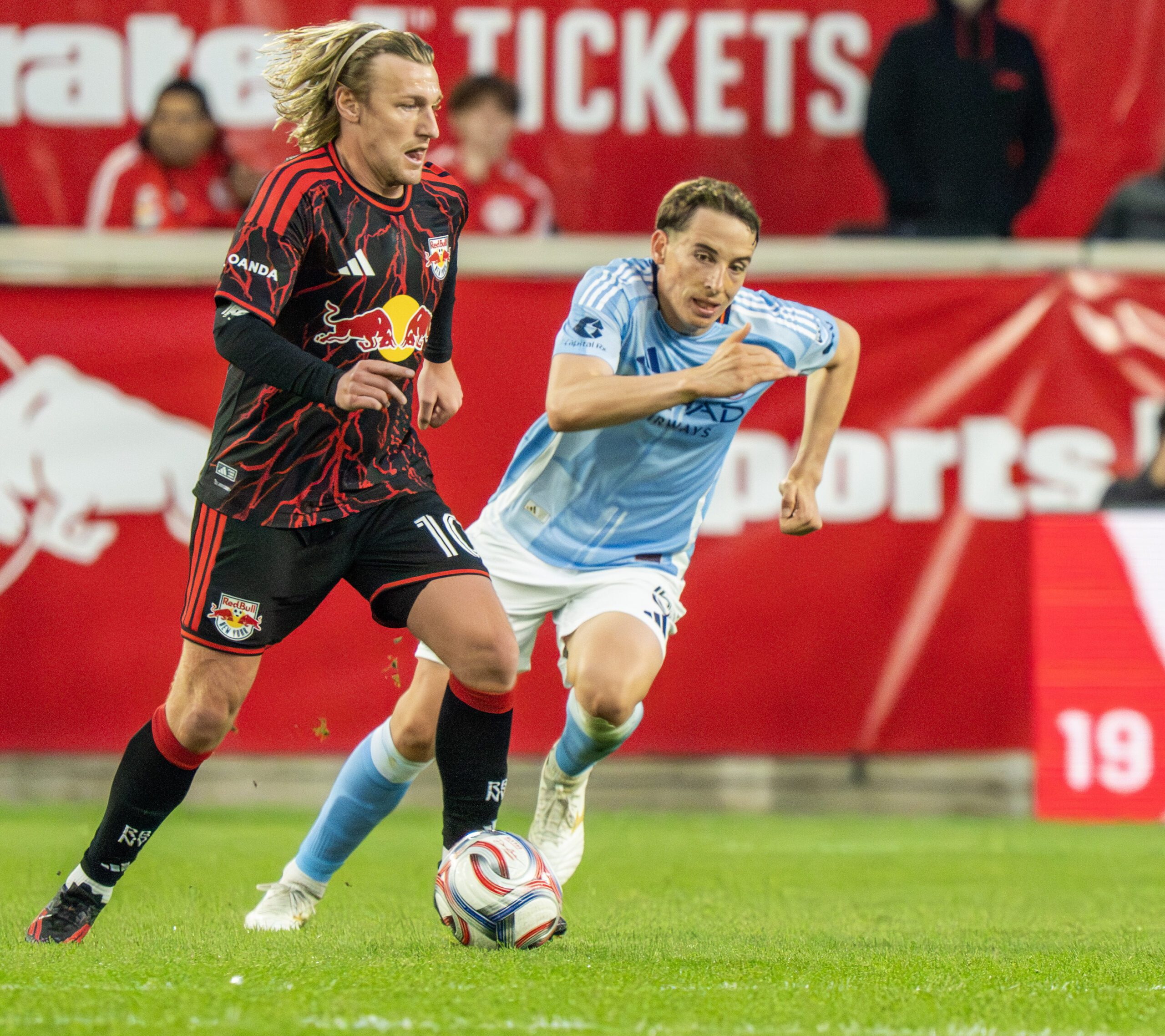 Red Bull New York midfielder Emil Forsberg runs with the ball.