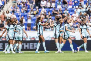 Gotham FC forward Jordynn Dudley celebrates with teammates.