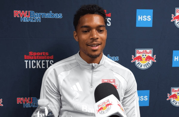 Red Bull New York defender Justin Che speaks to the media.