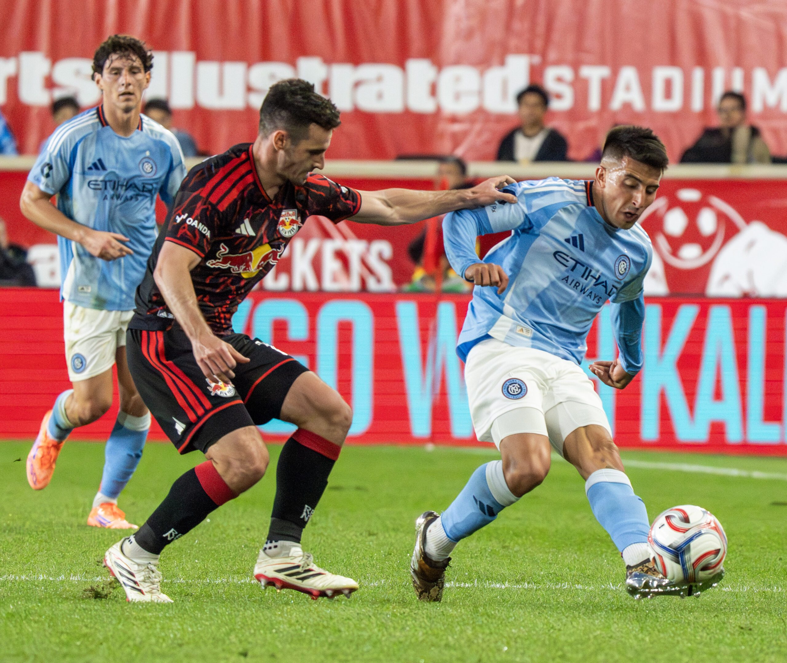 Red Bull New York defender Dylan Nealis defends against New York City FC.