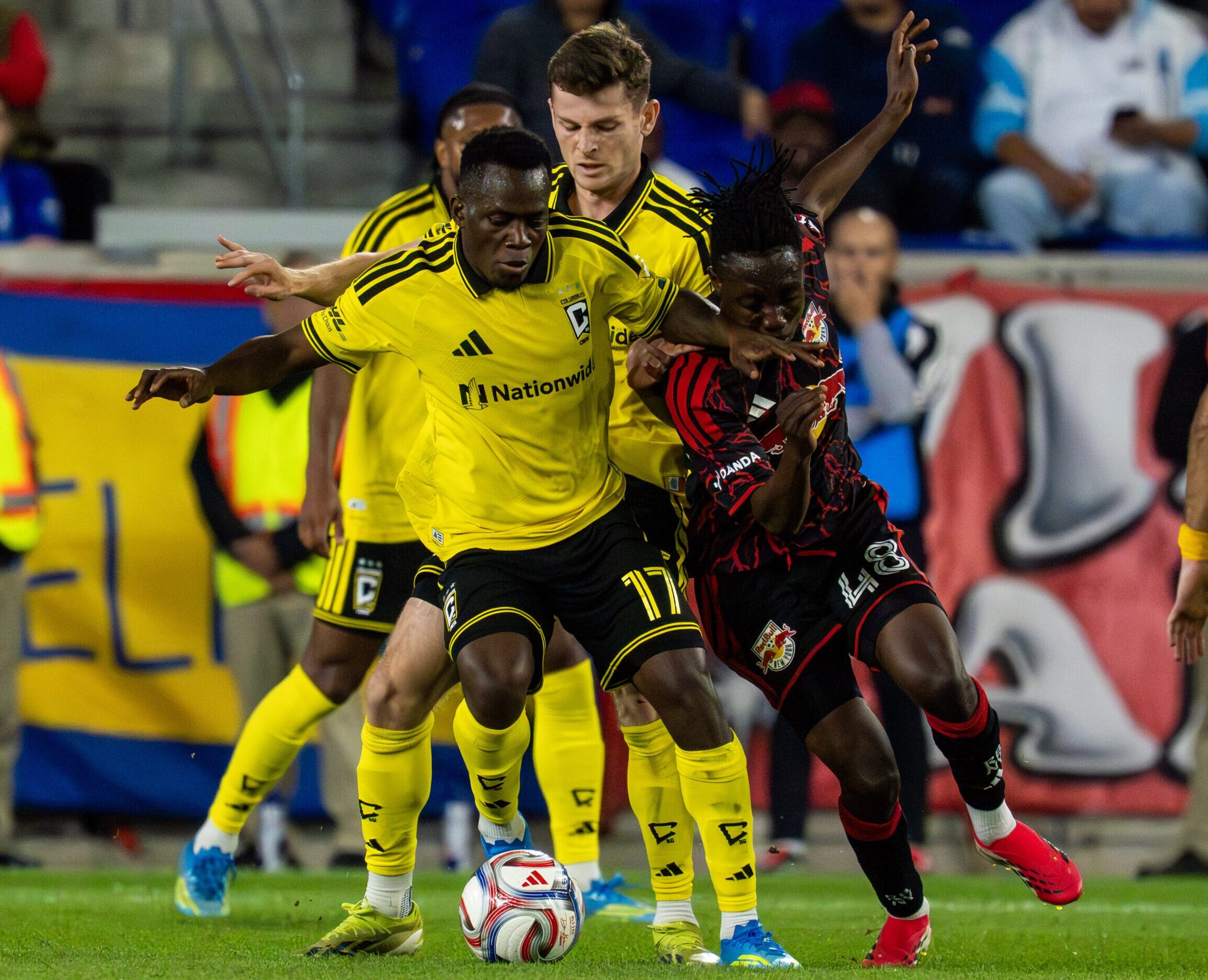 Red Bull New York midfielder Ronald Donkor competes for the ball against the Columbus Crew.