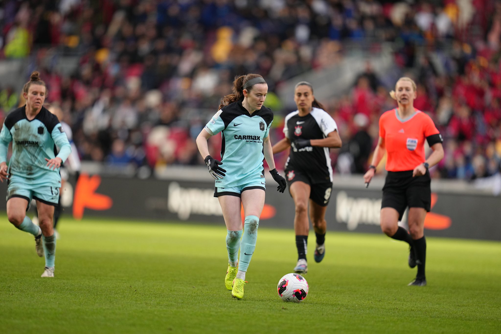 Gotham FC midfielder Rose Lavelle dribbles forward.