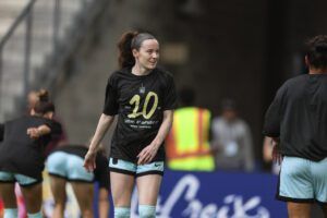 Gotham FC midfielder Rose Lavelle participates in pre-match warmups.