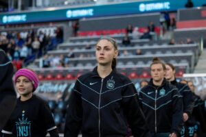 Gotham FC midfielder Sarah Schupansky takes the field before an NWSL match.