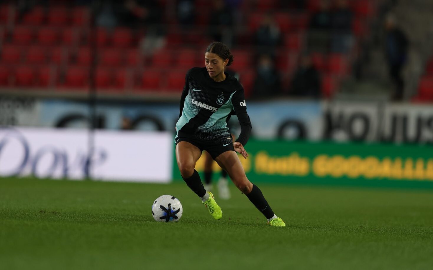 Gotham FC midfielder Sofia Cook performs a dribble.