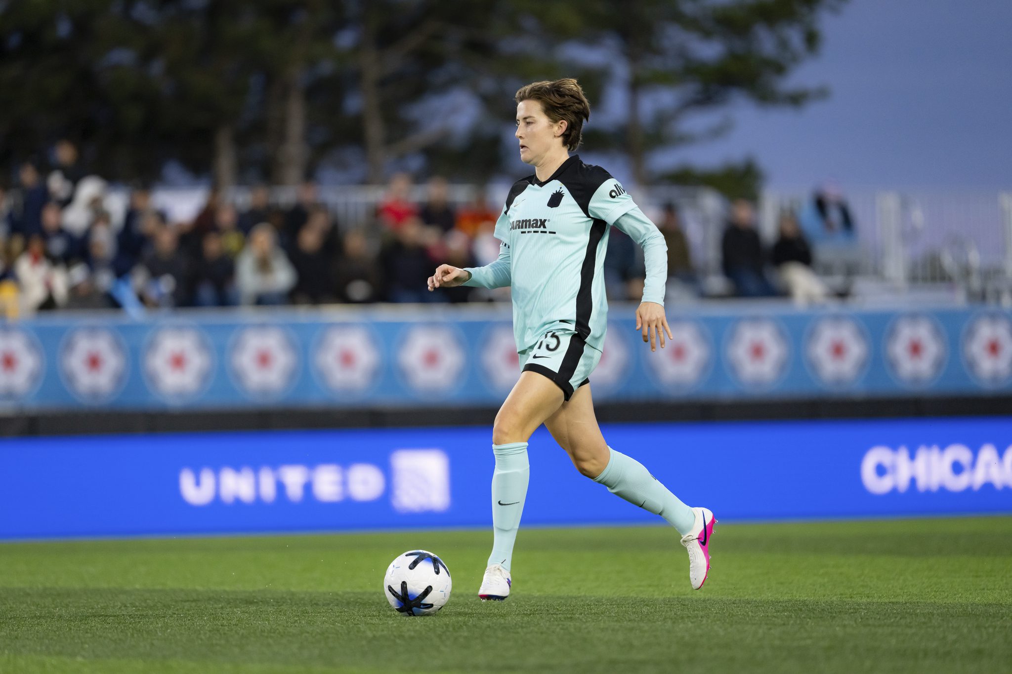 Gotham FC captain Tierna Davidson runs with the ball.