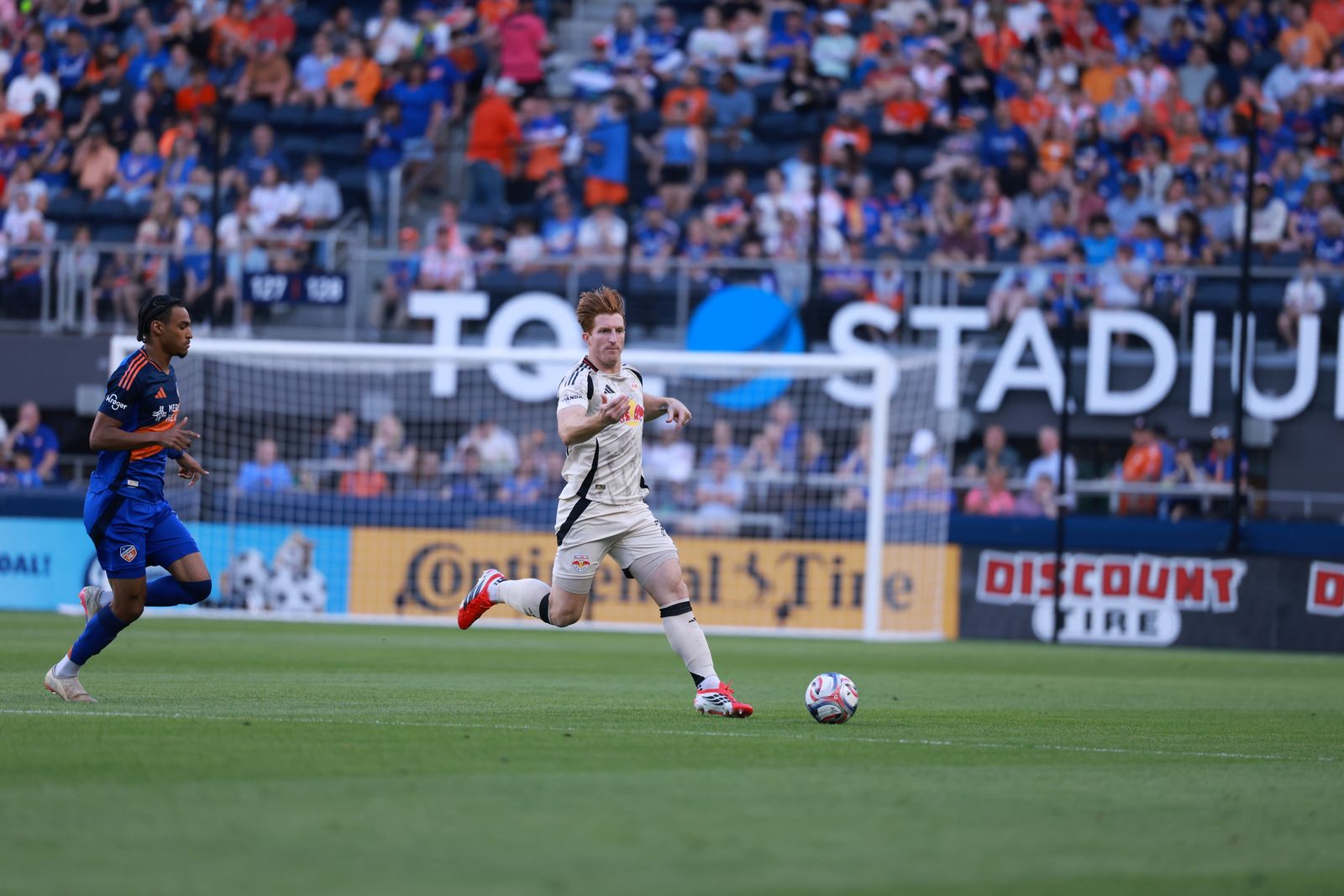 Red Bull New York defender Tim Parker runs with the ball.