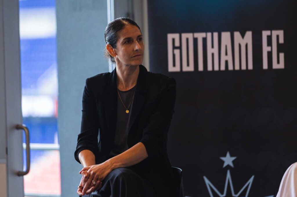 Gotham FC general manager Yael Averbuch West looks on.