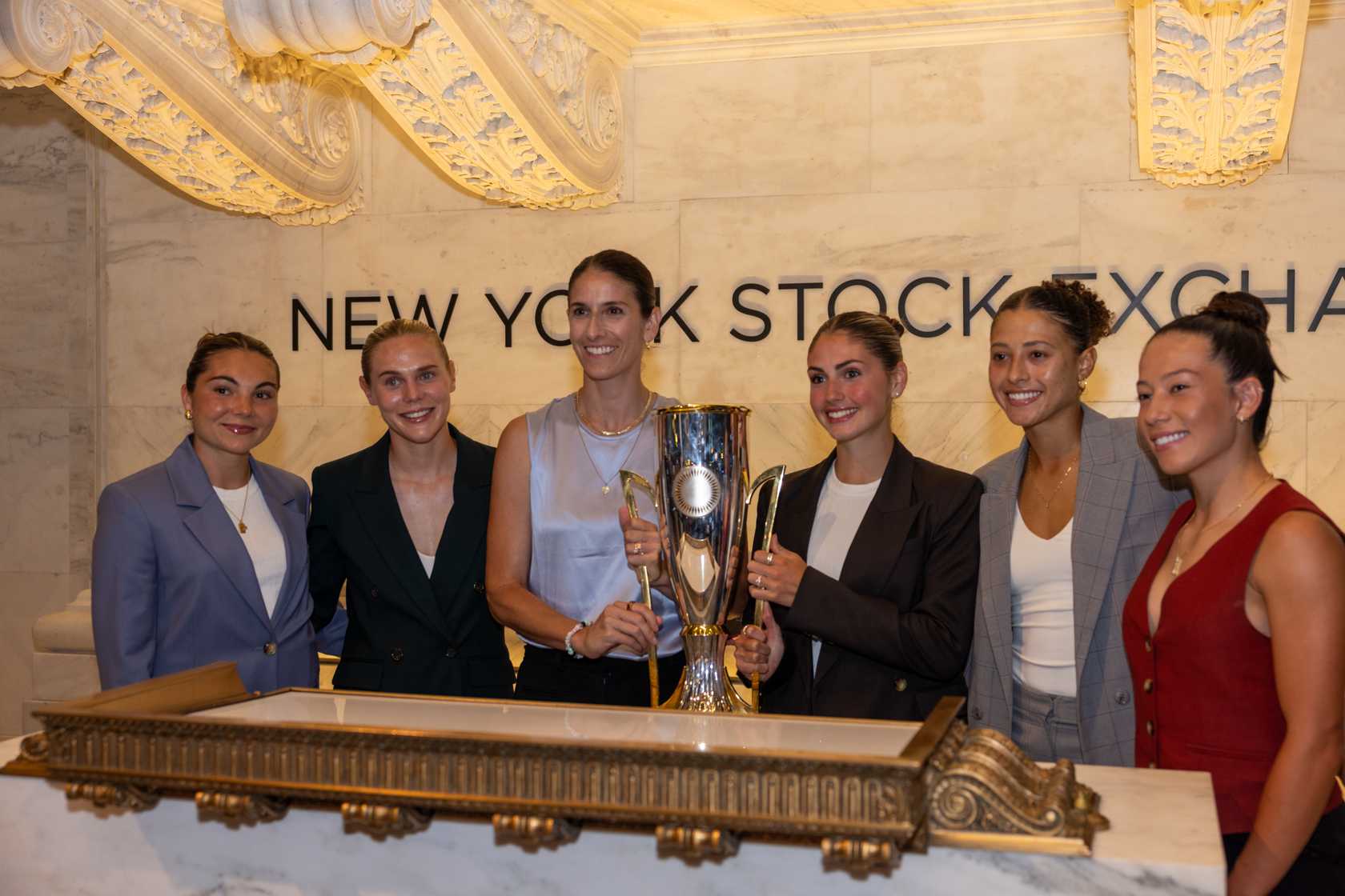 Gotham FC general manager Yael Averbuch West and players visit the New York Stock Exchange Building.