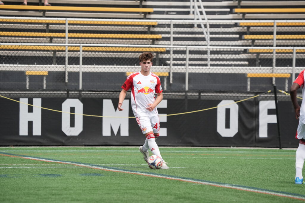 Red Bull New York II defender Connor Faello controls the ball.