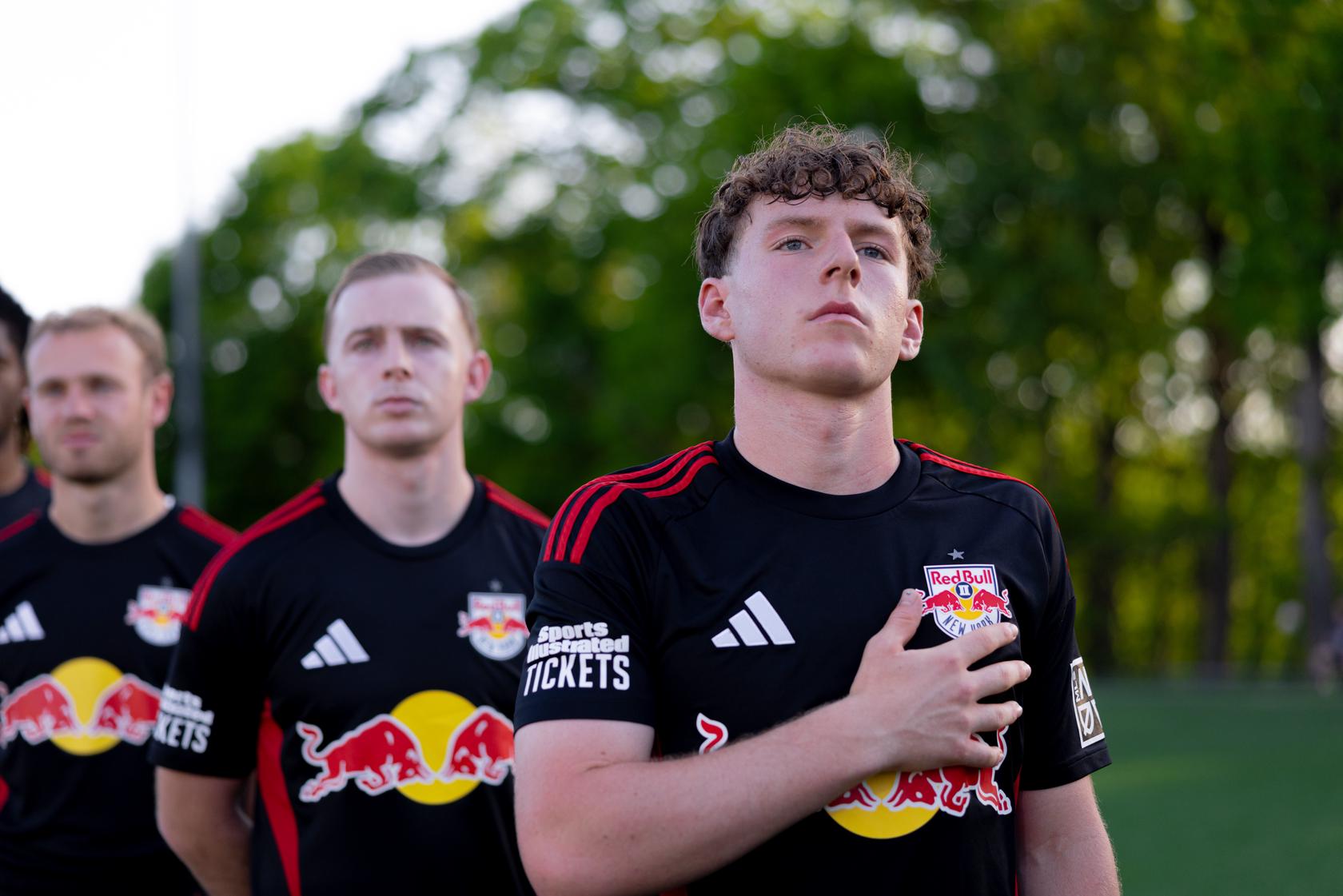 Deven Cadigan lines up alongside Red Bull New York II teammates.