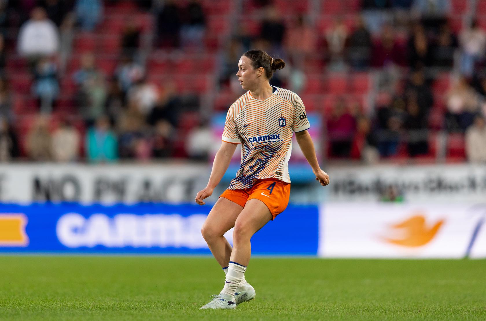 Gotham FC defender Lilly Reale plays a pass during an NWSL match.