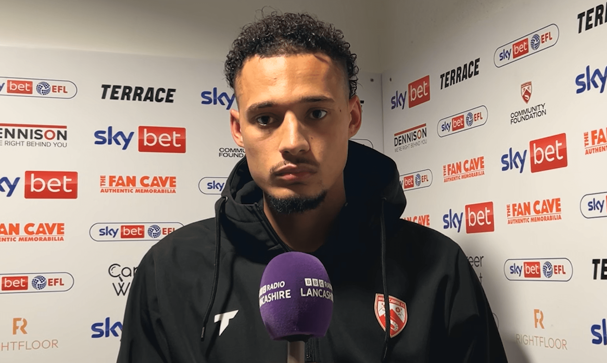 Rhys Williams speaks to reporters.