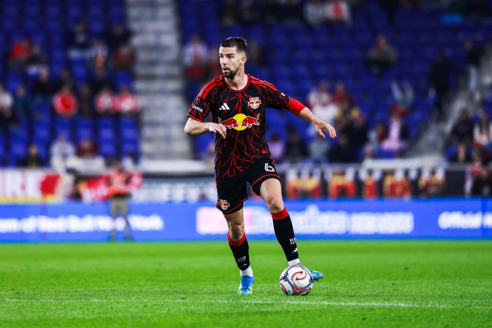 Red Bull New York defender Robert Voloder performs a dribble.