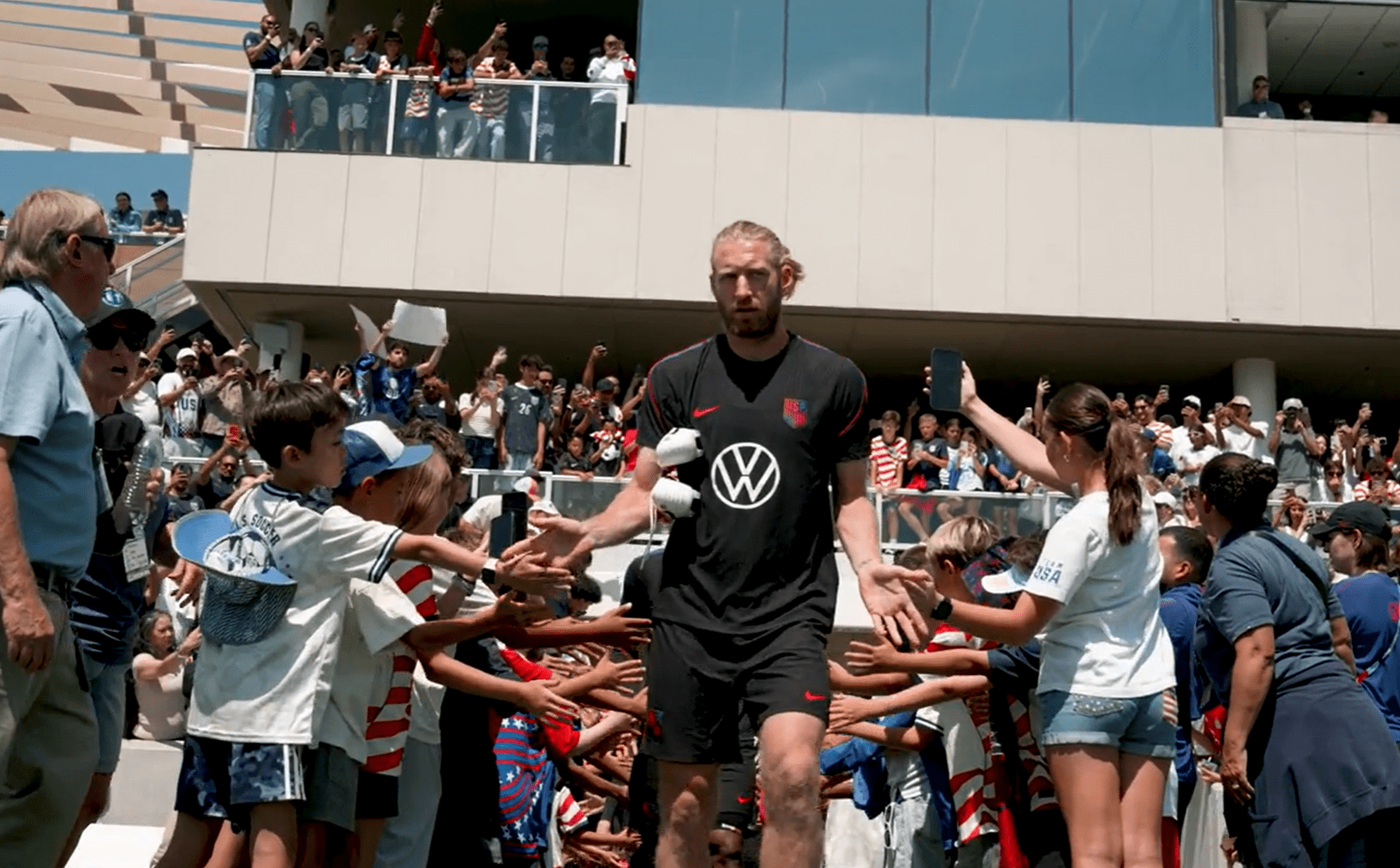 United States defender Tim Ream greets fans at the USMNT training camp.