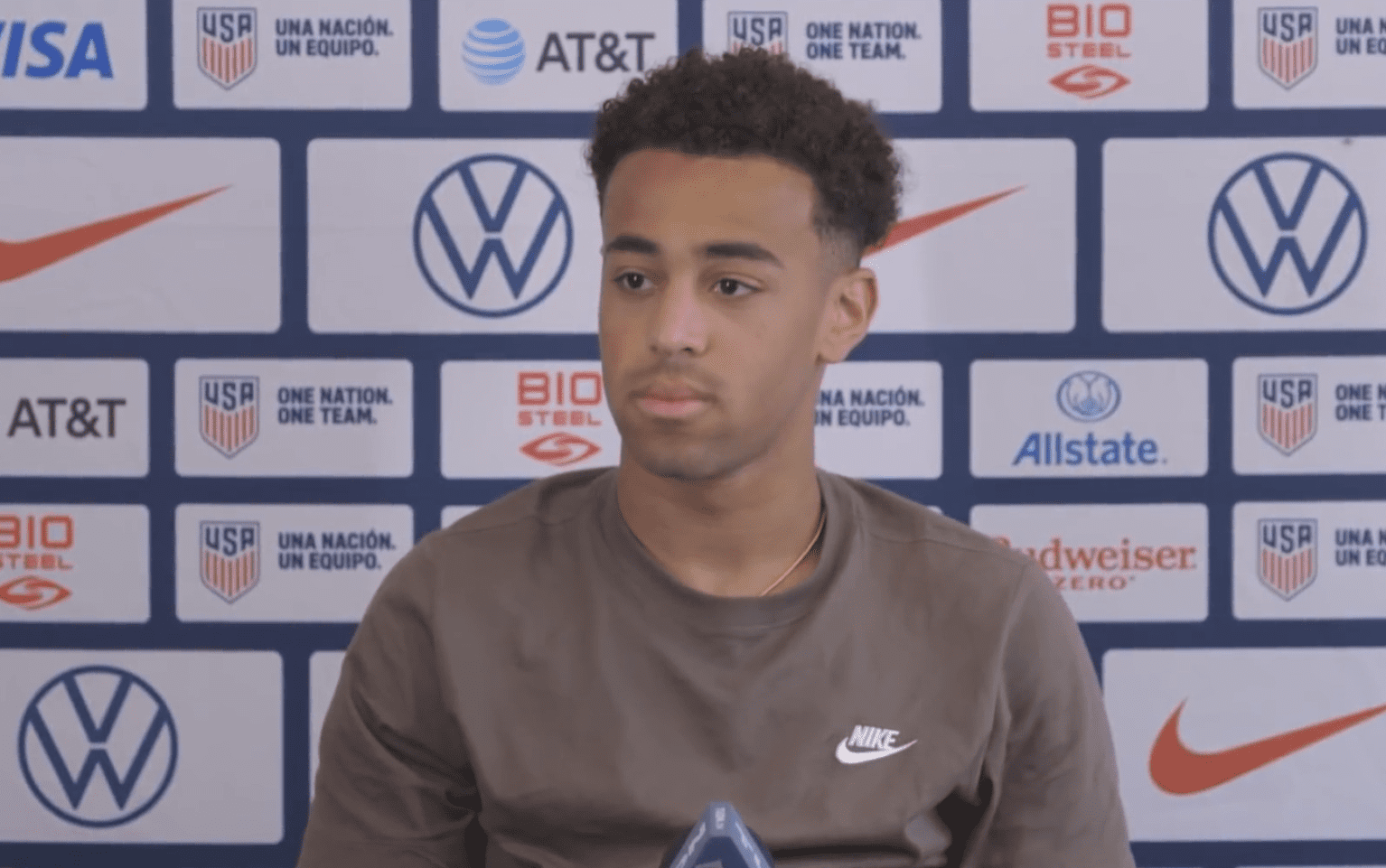 United States national team midfielder Tyler Adams speaks to reporters.