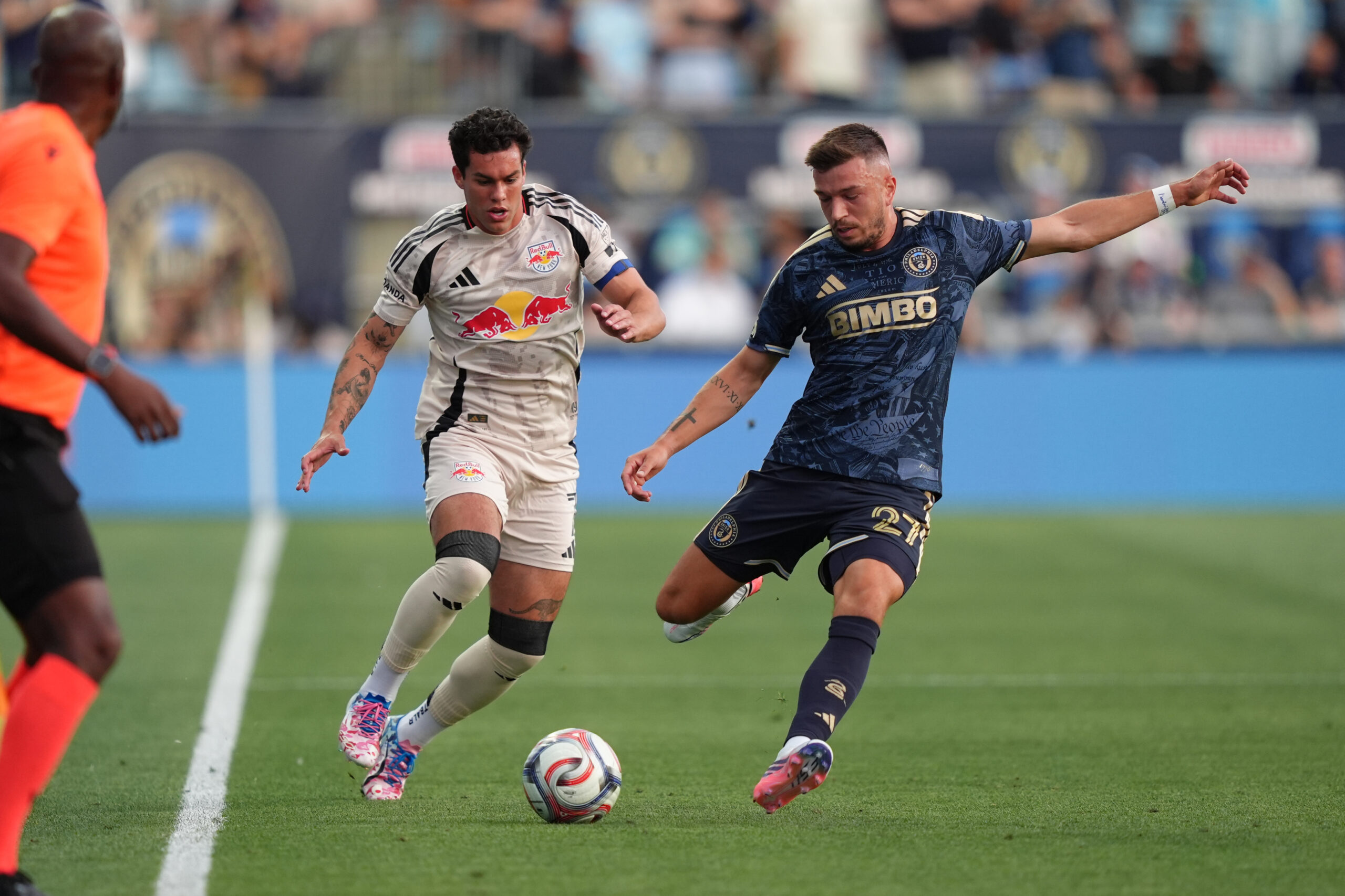 Red Bull New York forward Cade Cowell and Philadelphia Union defender Kai Wagner battle for the ball in the first half at Subaru Park.