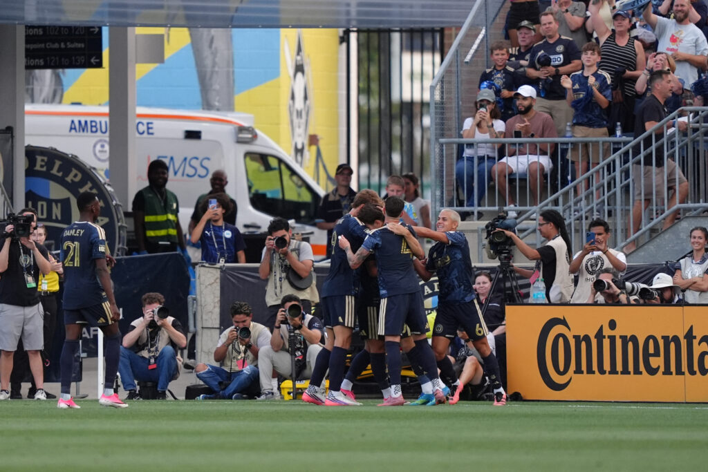 Philadelphia Union forward Milan Iloski celebrates with teammates after scoring a goal against Red Bull New York in the first half at Subaru Park.
