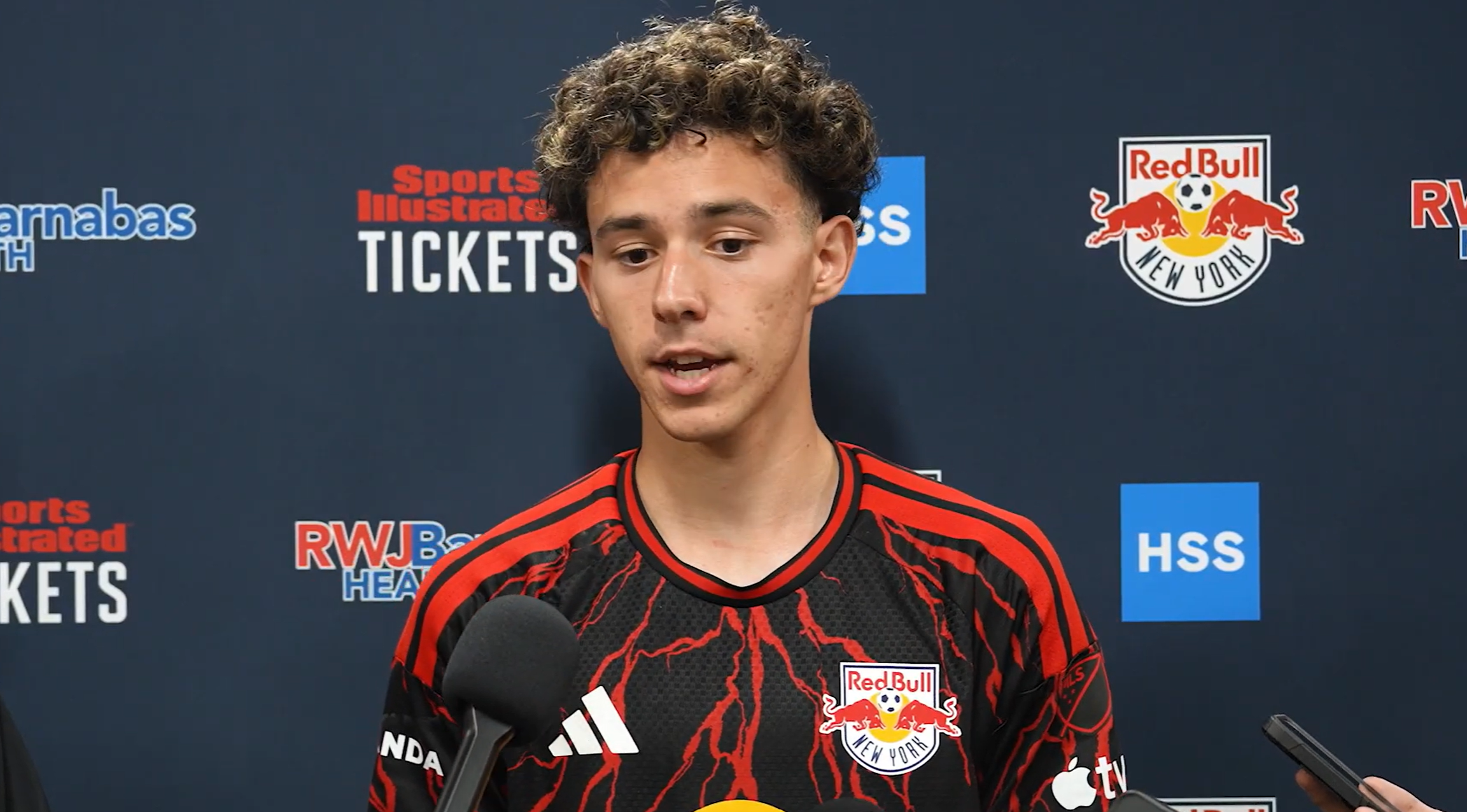 Red Bull New York midfielder Adri Mehmeti speaks with the media.