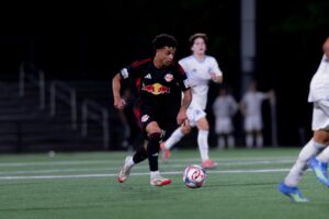 Red Bull New York II forward Christian Gallagher advances the ball.