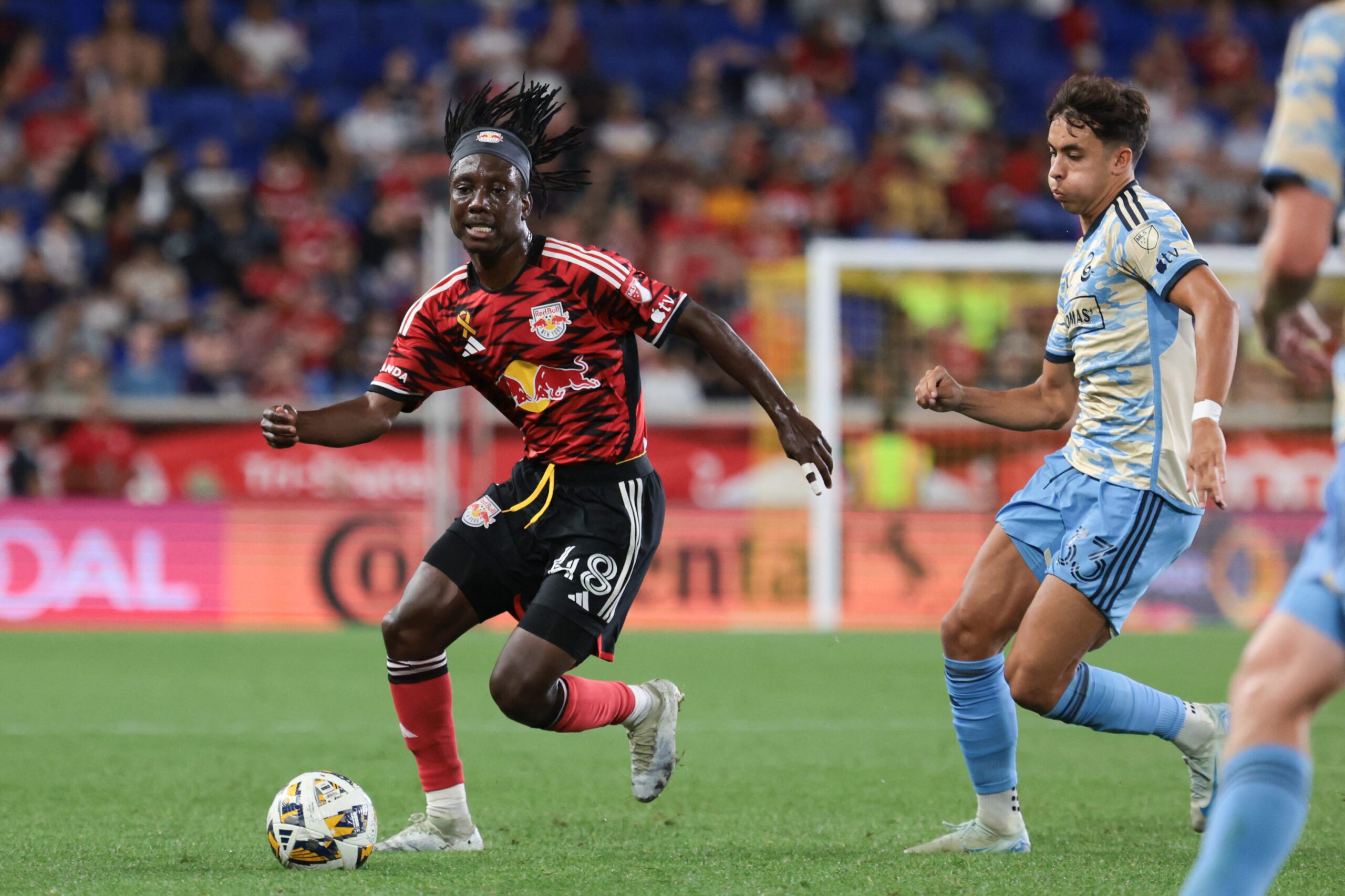 Red Bull New York midfielder Ronald Donkor plays the ball against the Philadelphia Union during the second half at Red Bull Arena.
