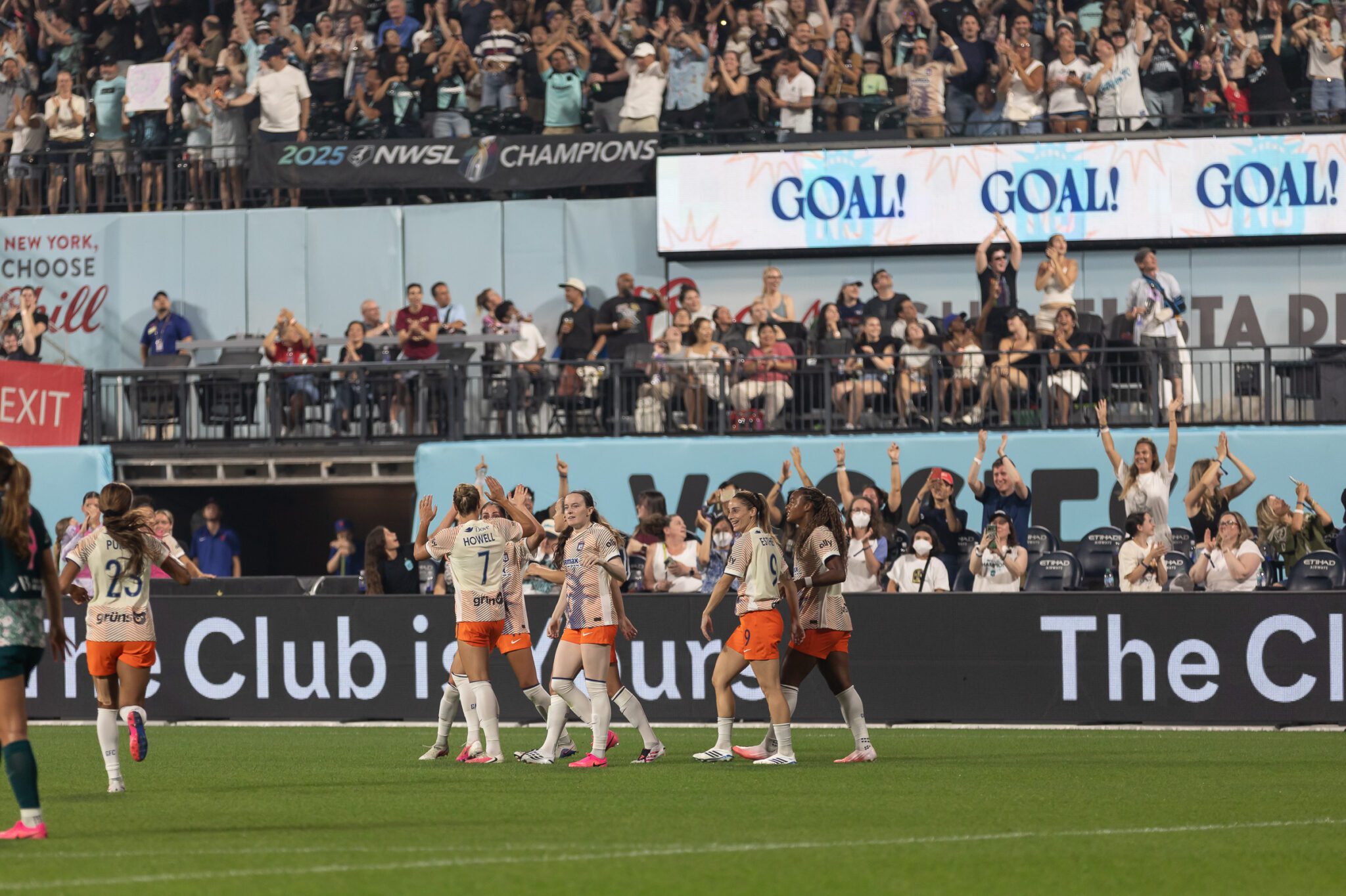 Gotham FC teammates celebrate together at The Queens Classic.