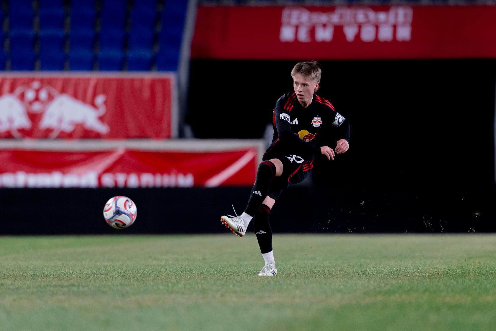 Red Bull New York II midfielder Nate Worth attempts a pass during an MLS Next Pro match.