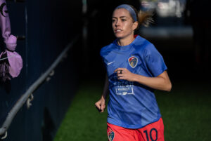 North Carolina Courage midfielder Denise O'Sullivan jogs onto the field during warmups.