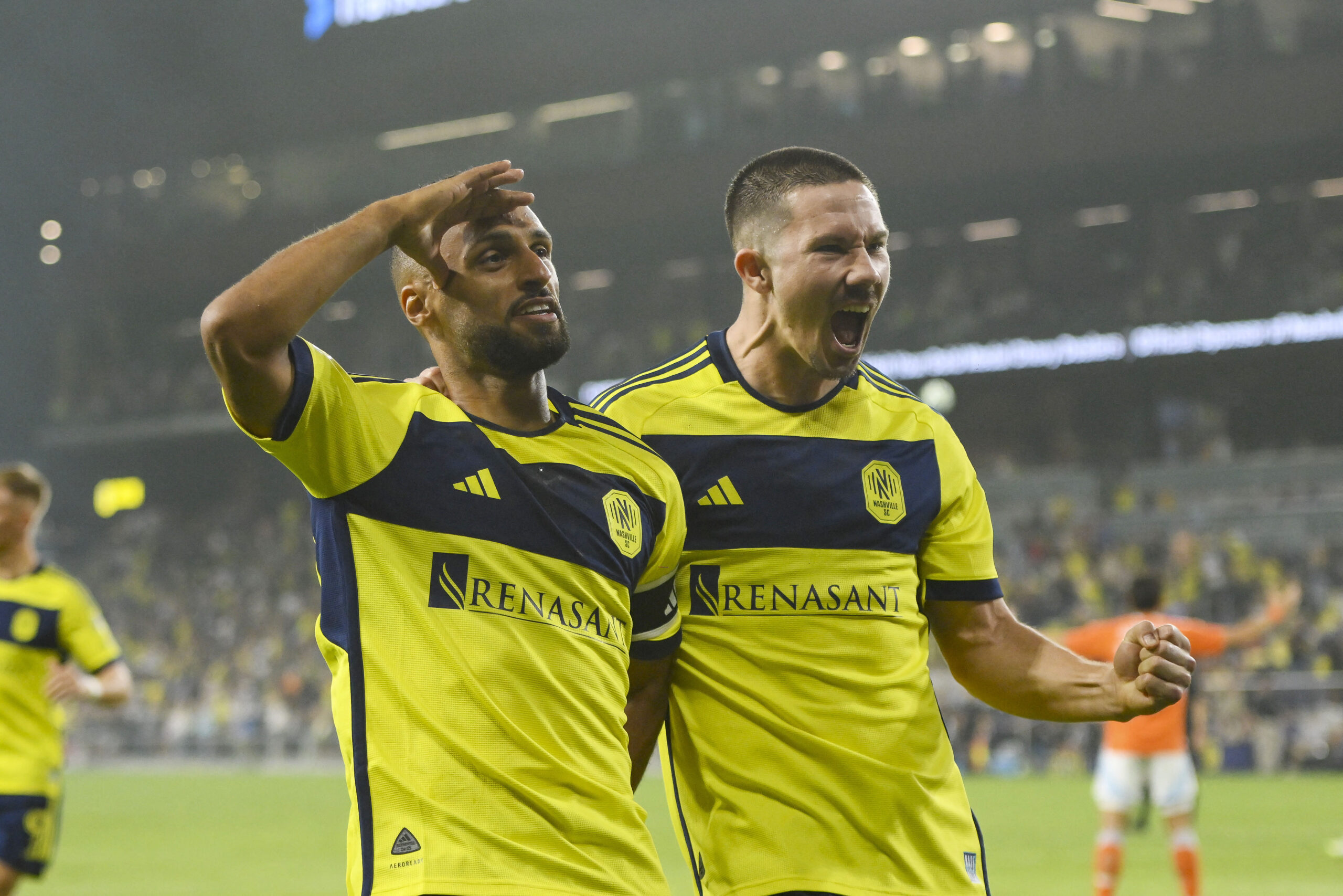Nashville SC forward Sam Surridge celebrates with forward Hany Mukhtar.