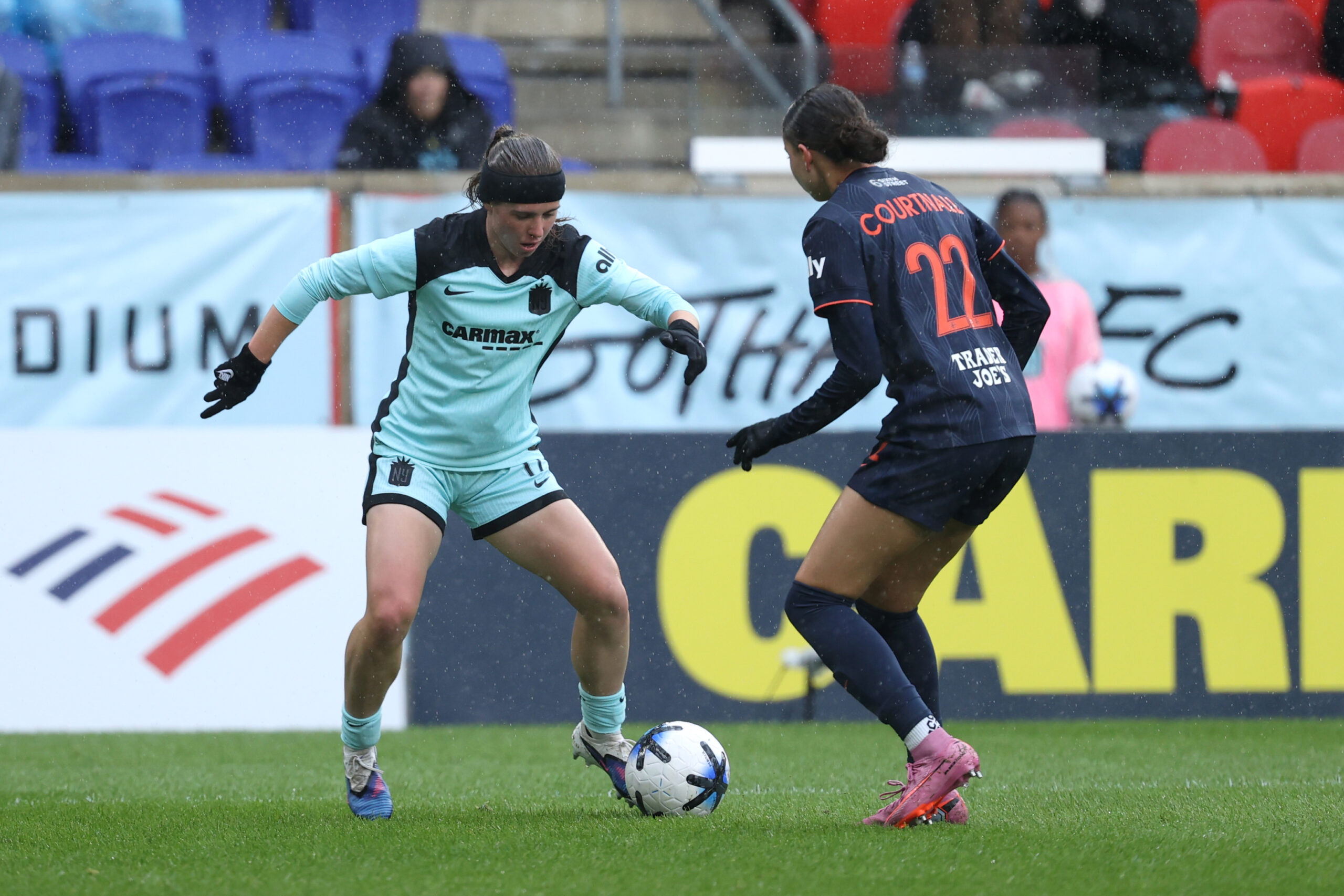 Gotham FC forward Mak Whitham runs with the ball against Bay FC defender Brooklyn Courtnall during the second half at Sports Illustrated Stadium.
