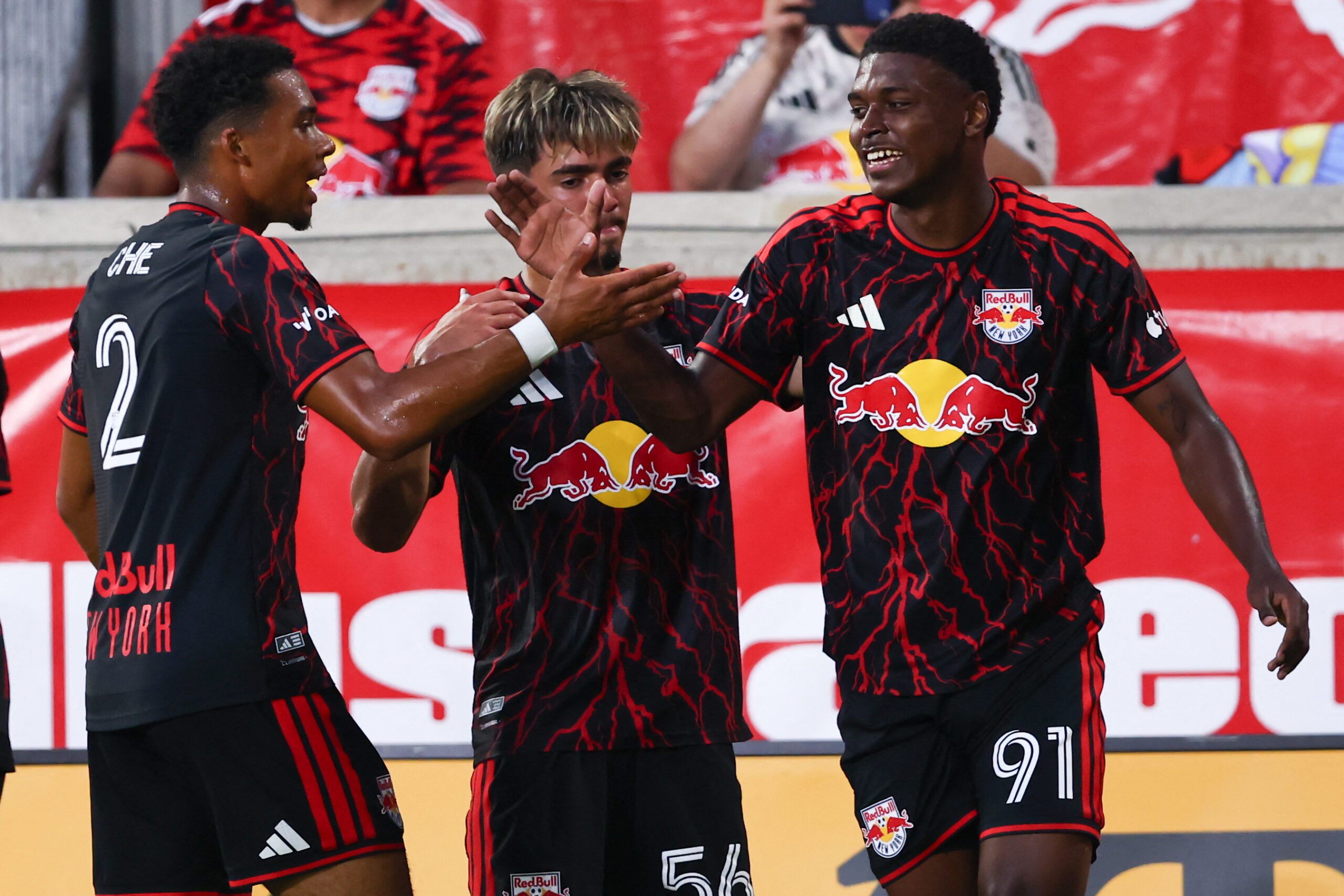 Red Bull New York forward Mijahir Jimenez celebrates his goal with teammates at Sports Illustrated Stadium.